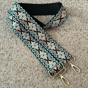Adjustable purse strap with gold tone hooks